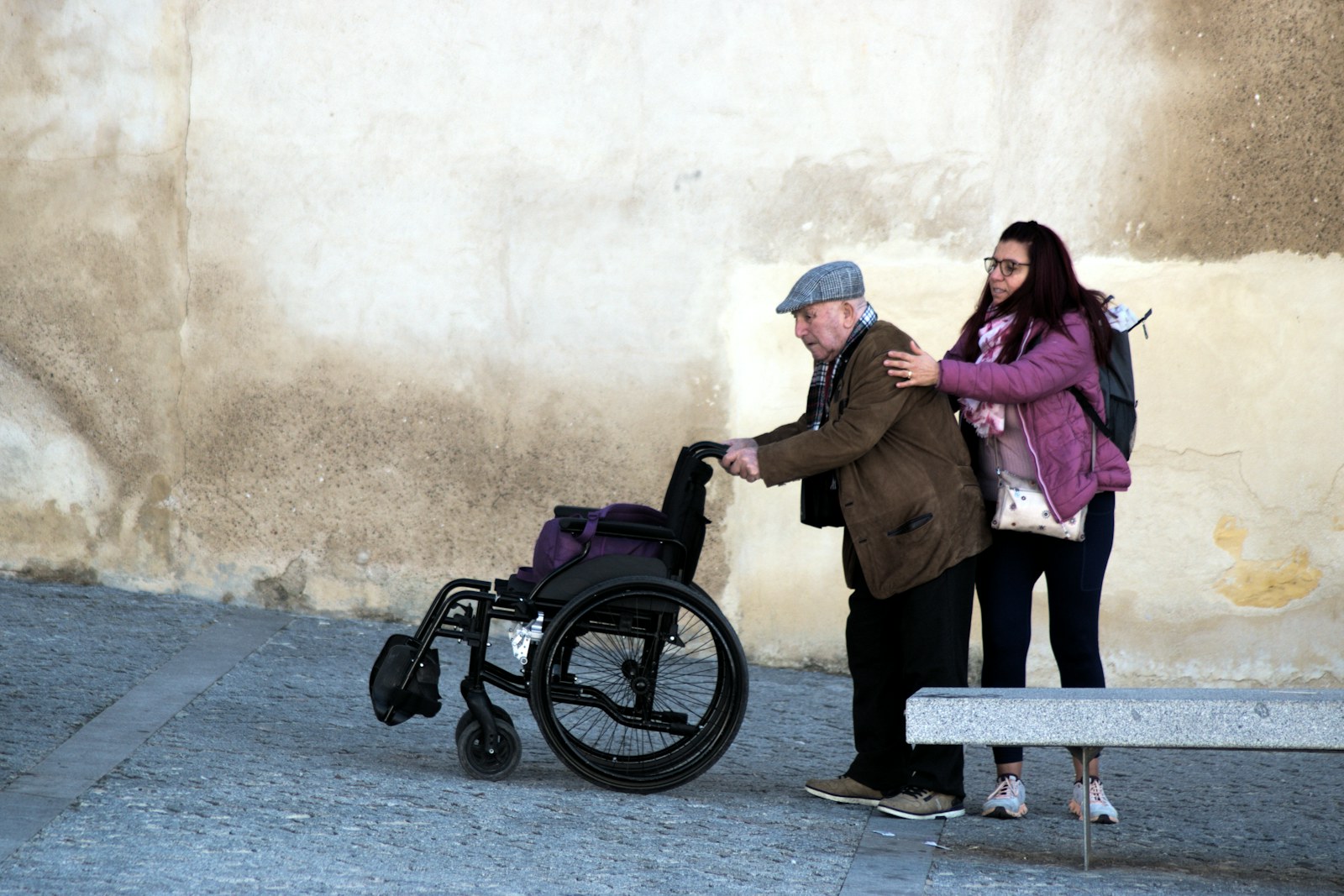 Caregiver and wheelchair user